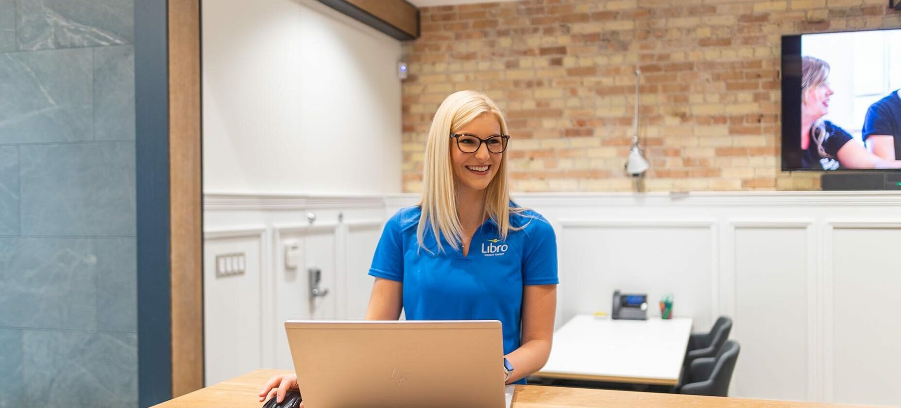 Female Libro Staff with laptop