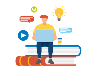 Man sitting on books looking at laptop learning