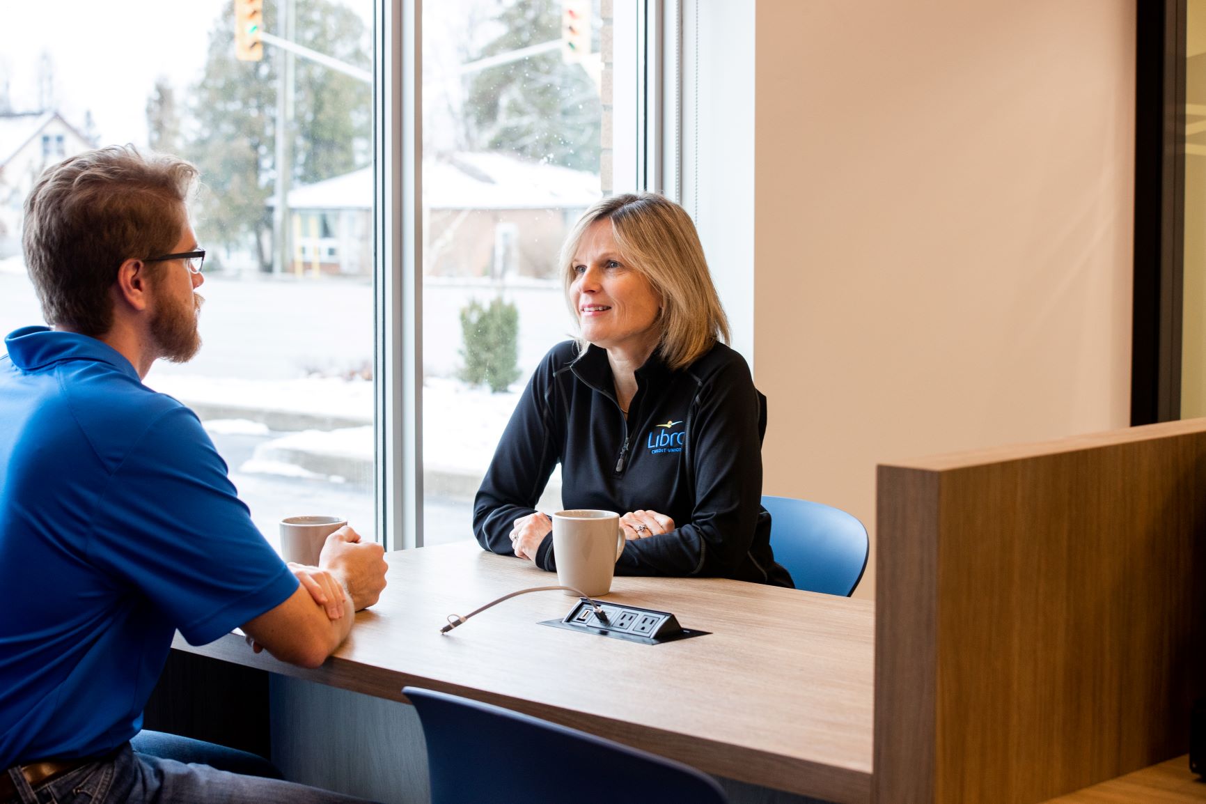 Photo of a Libro Coach and employee